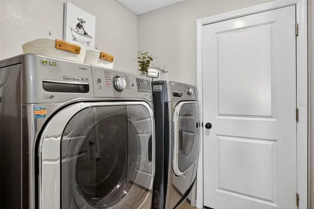 a utility room with dryer and washer