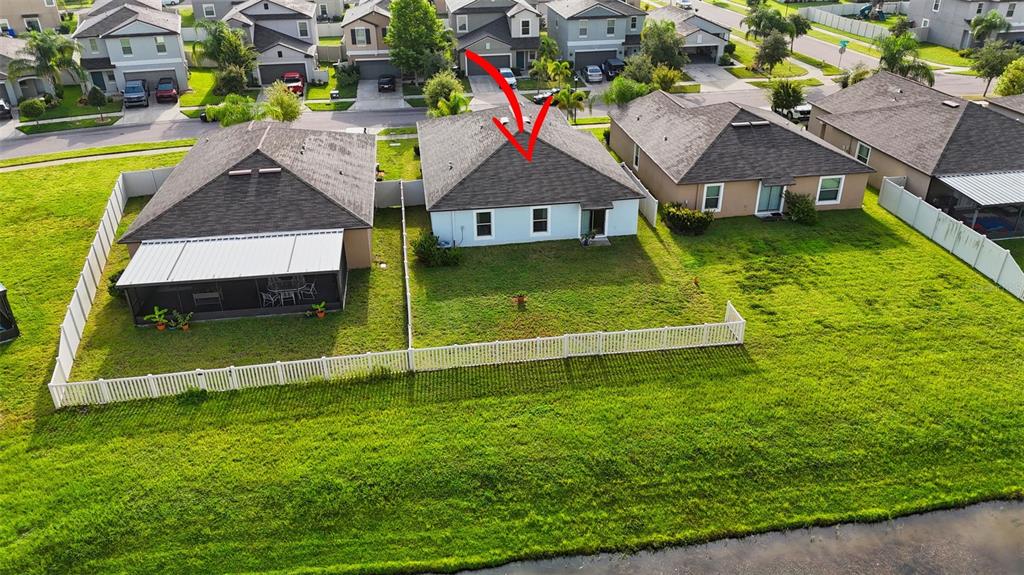 9645 Lemon Drop Loop Ruskin, FL 33573 - Photo 40 of 49 a view of a house with a swimming pool