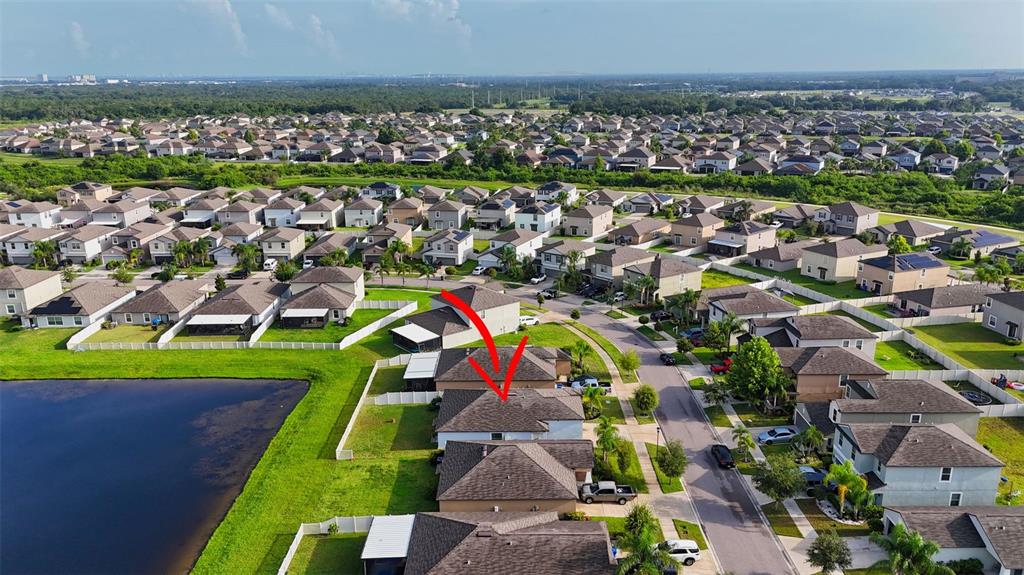 9645 Lemon Drop Loop Ruskin, FL 33573 - Photo 43 of 49 an aerial view of multiple house