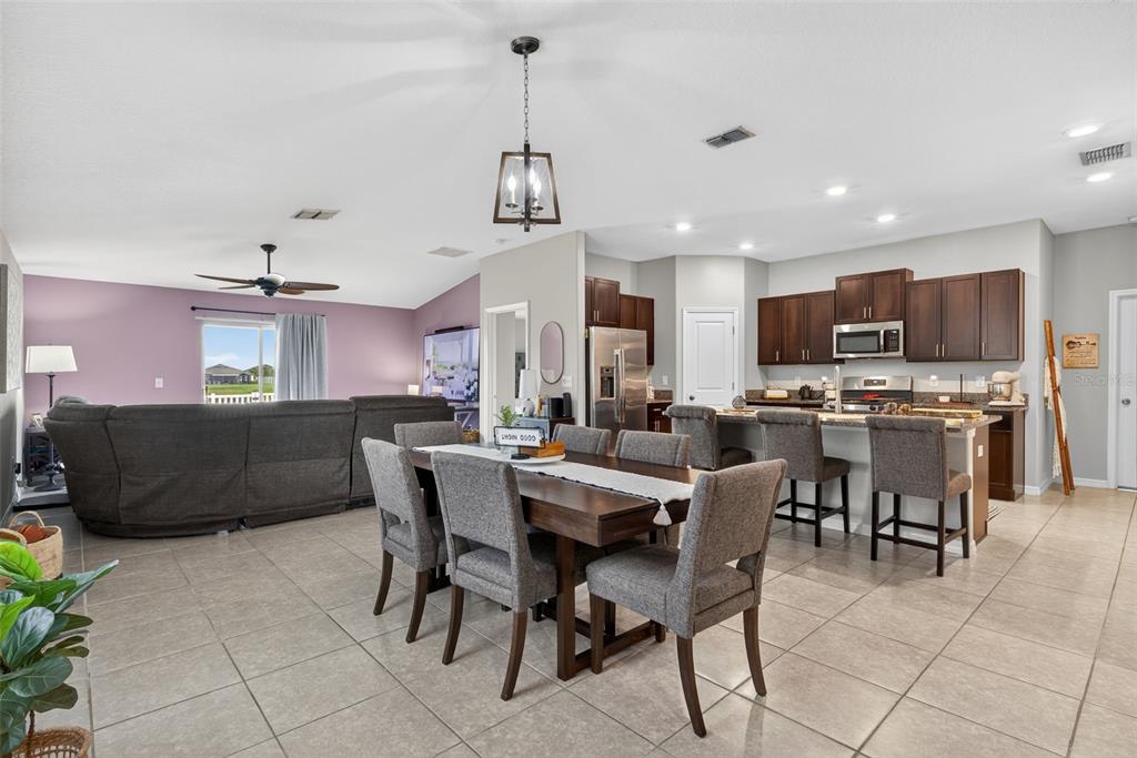 9645 Lemon Drop Loop Ruskin, FL 33573 - Photo 8 of 49 a view of a dining room kitchen and a counter top space