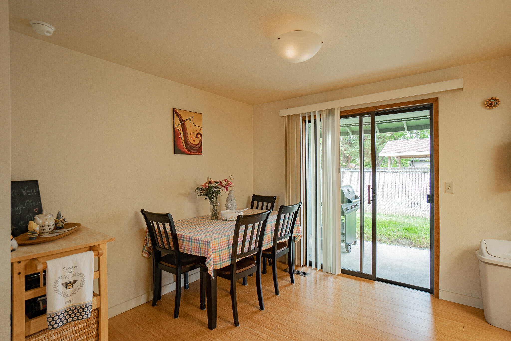 537 Bell Road Talent, OR 97540 - Photo 8 of 23 a view of a dining room with furniture and wooden floor
