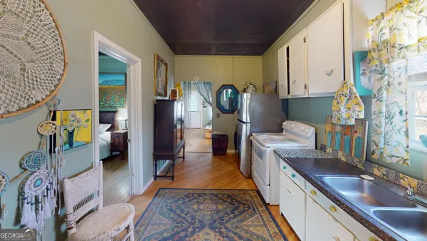 a kitchen with granite countertop lots of counter top space
