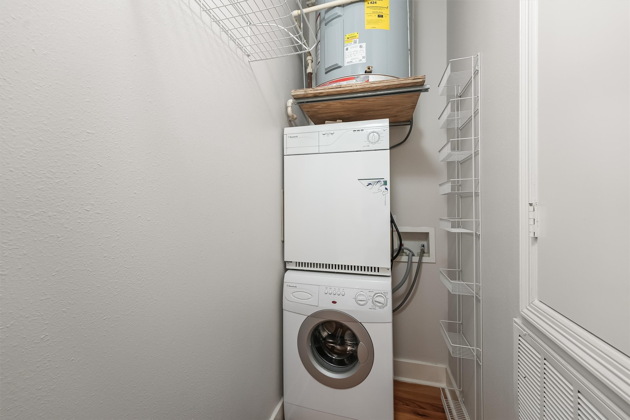 104 21st Street, Unit 203 Galveston, TX 77550 - Photo 18 of 27 a utility room with dryer and washer