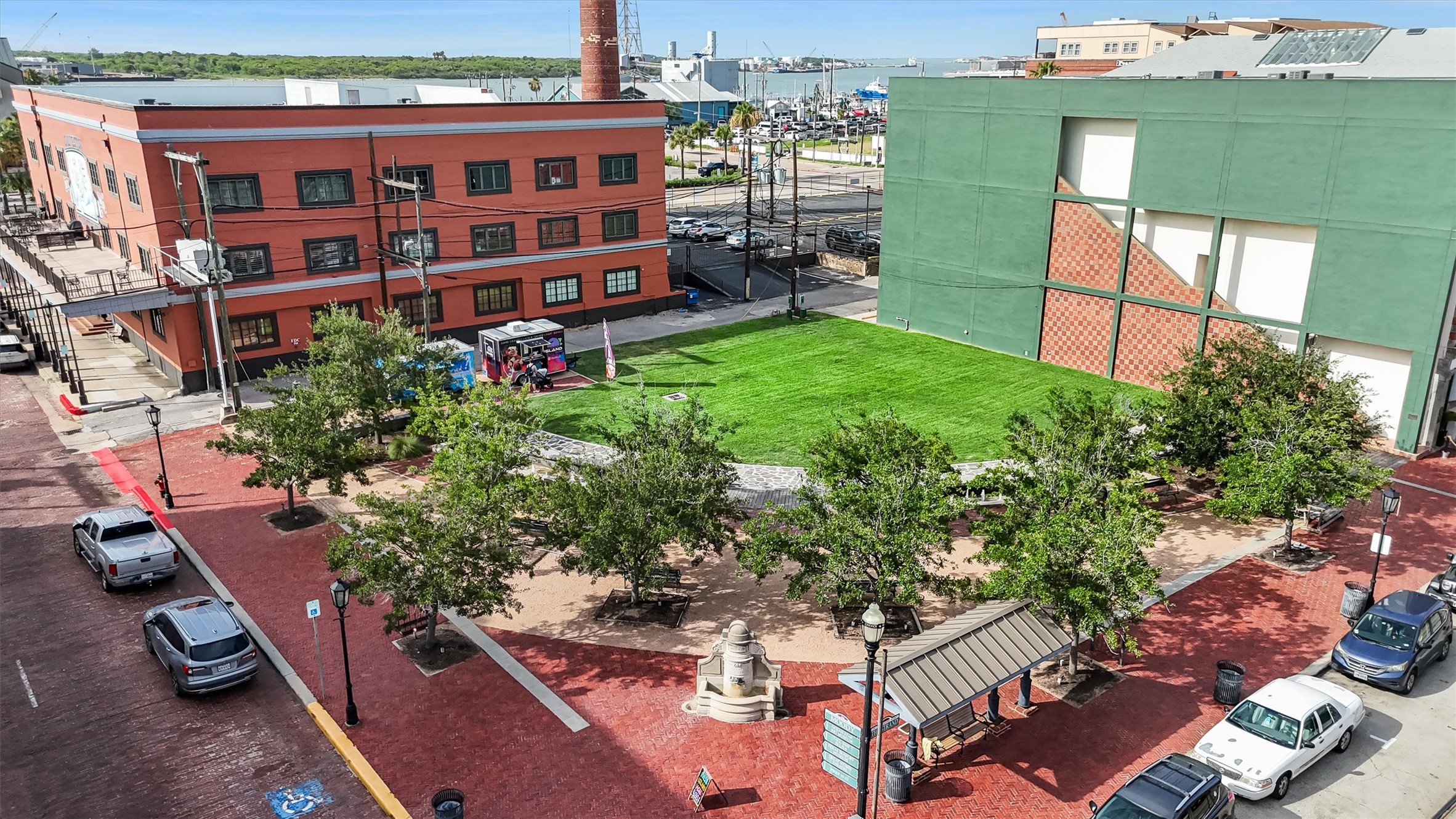 104 21st Street, Unit 203 Galveston, TX 77550 - Photo 23 of 27 an aerial view of a house with backyard space and balcony