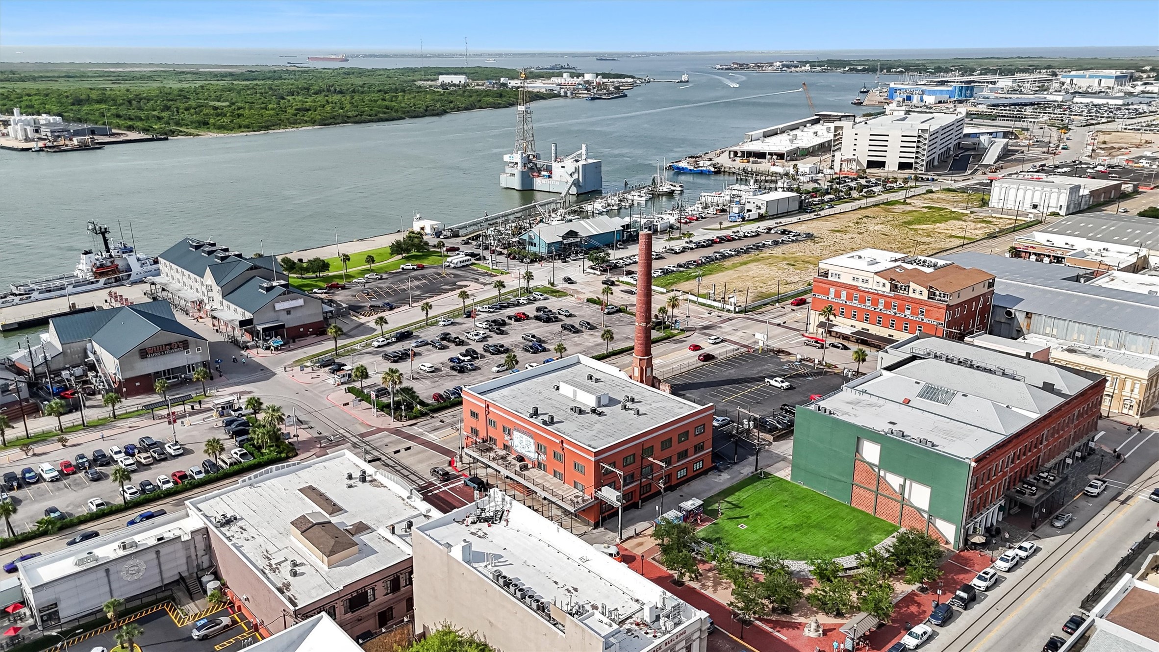 104 21st Street, Unit 203 Galveston, TX 77550 - Photo 25 of 27 an aerial view of a city with lake view