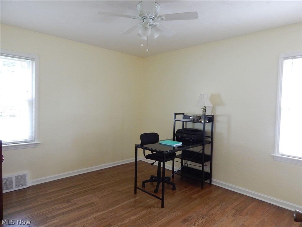 5701 Ackley Road Parma, OH 44129 - Photo 11 of 31 Bdroom 2 is being used as an office. Updated Floors, Windows and Ceiling fan & Paint.