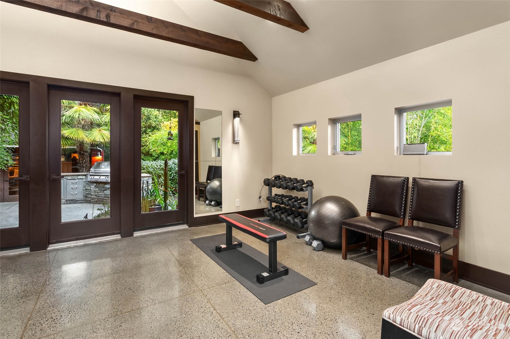 10618 Northeast 155th Place Bothell, WA 98011 - Photo 11 of 40 a living room with furniture and a floor to ceiling window