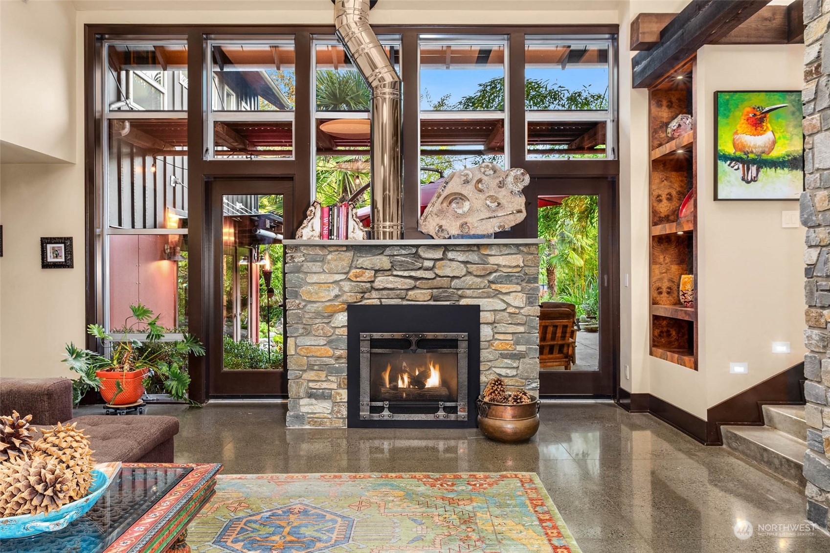 10618 Northeast 155th Place Bothell, WA 98011 - Photo 16 of 40 a living room with furniture and a fireplace