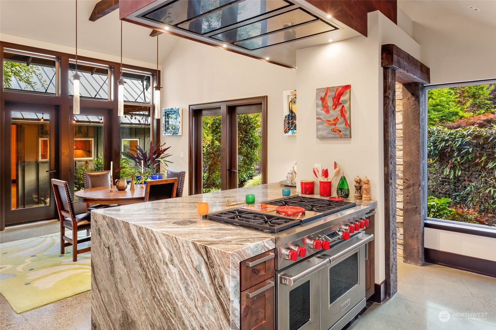 10618 Northeast 155th Place Bothell, WA 98011 - Photo 25 of 40 a kitchen with a stove and a dining table