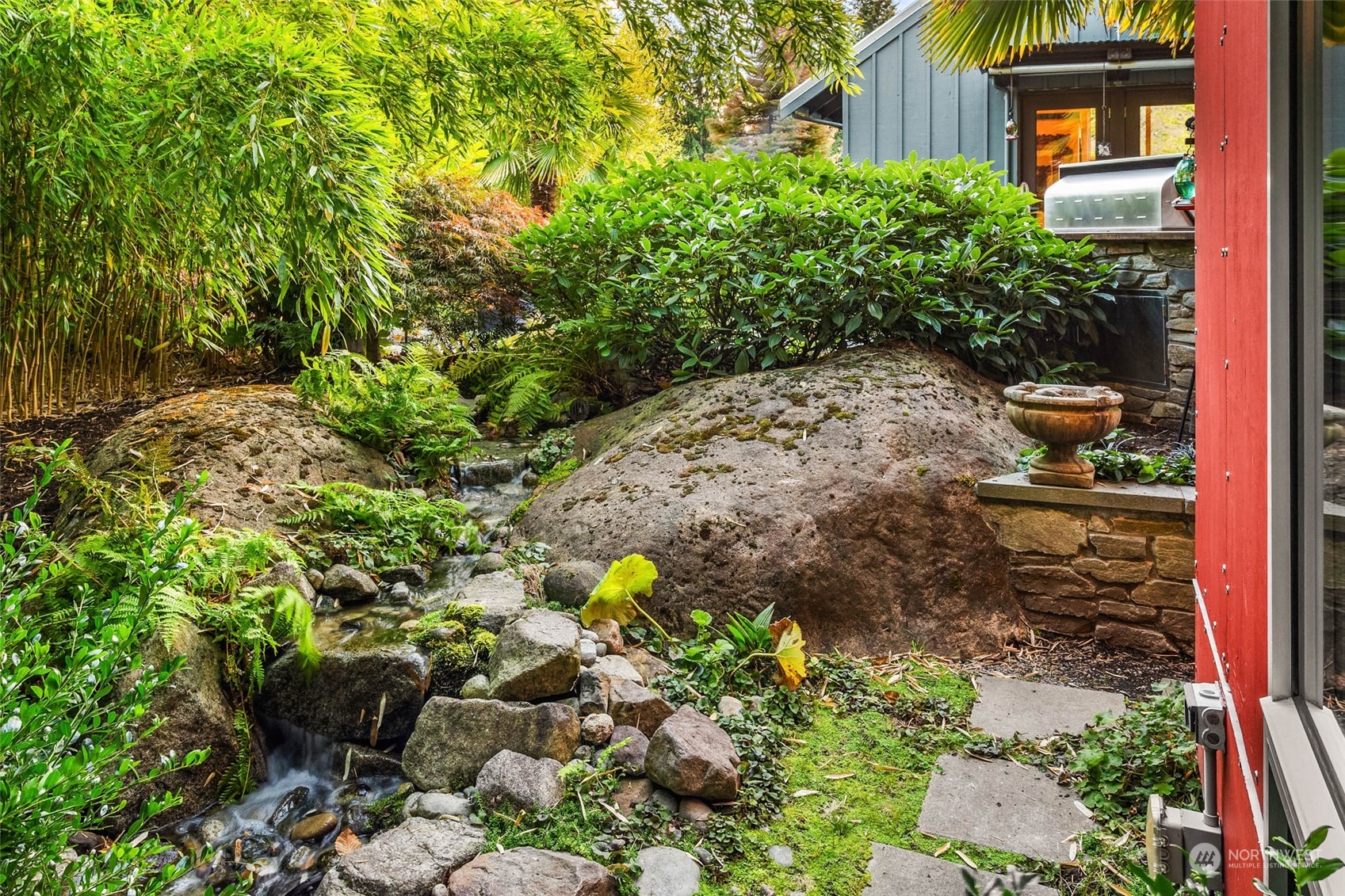 10618 Northeast 155th Place Bothell, WA 98011 - Photo 5 of 40 a plant that is in a garden