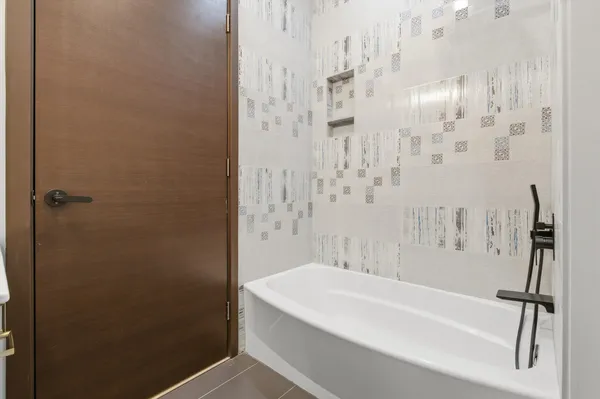 a bathroom with a bathtub