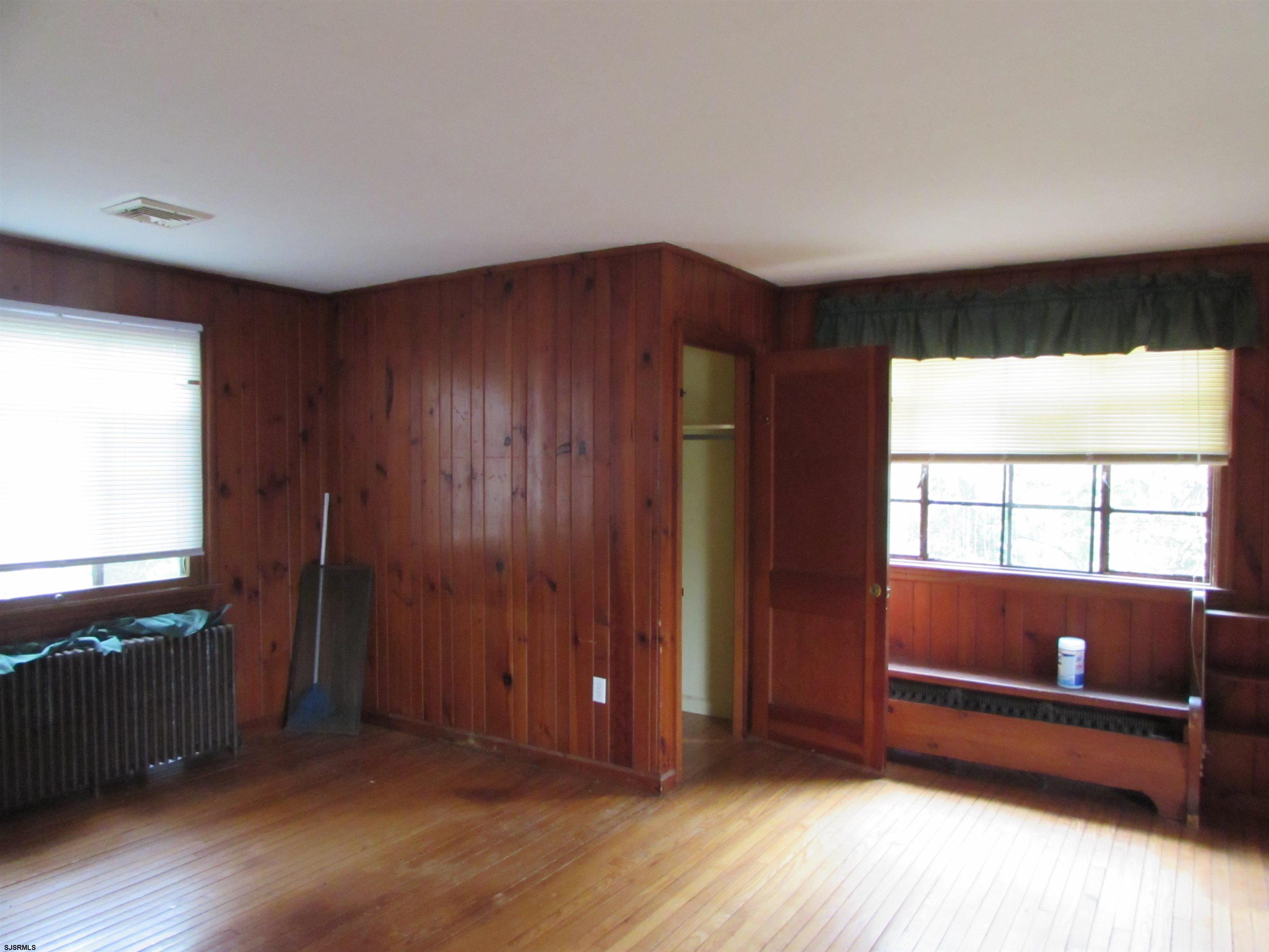 744 Shore Road Linwood, NJ 08221 - Photo 17 of 43 wooden floor and windows in a room