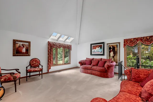 a bathroom with a sink a large mirror and a bathtub