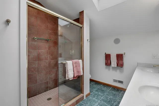 a view of a chairs and table on the wooden deck