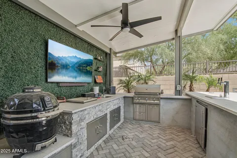 a kitchen with a stove a sink and a table