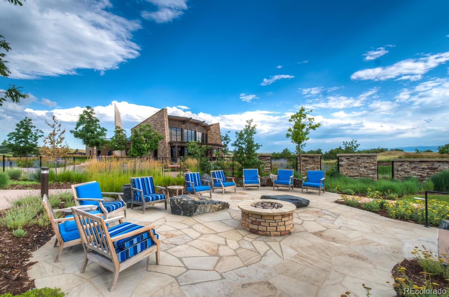 10654 Sundial Rim Road Highlands Ranch, CO 80126 - Photo 35 of 40 a backyard of a house with outdoor seating