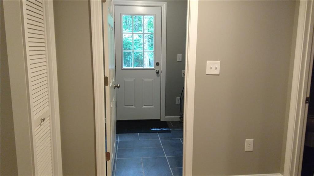 369 Schellinger Road Poland, ME 04274 - Photo 14 of 24 Rear exit, utility room,...