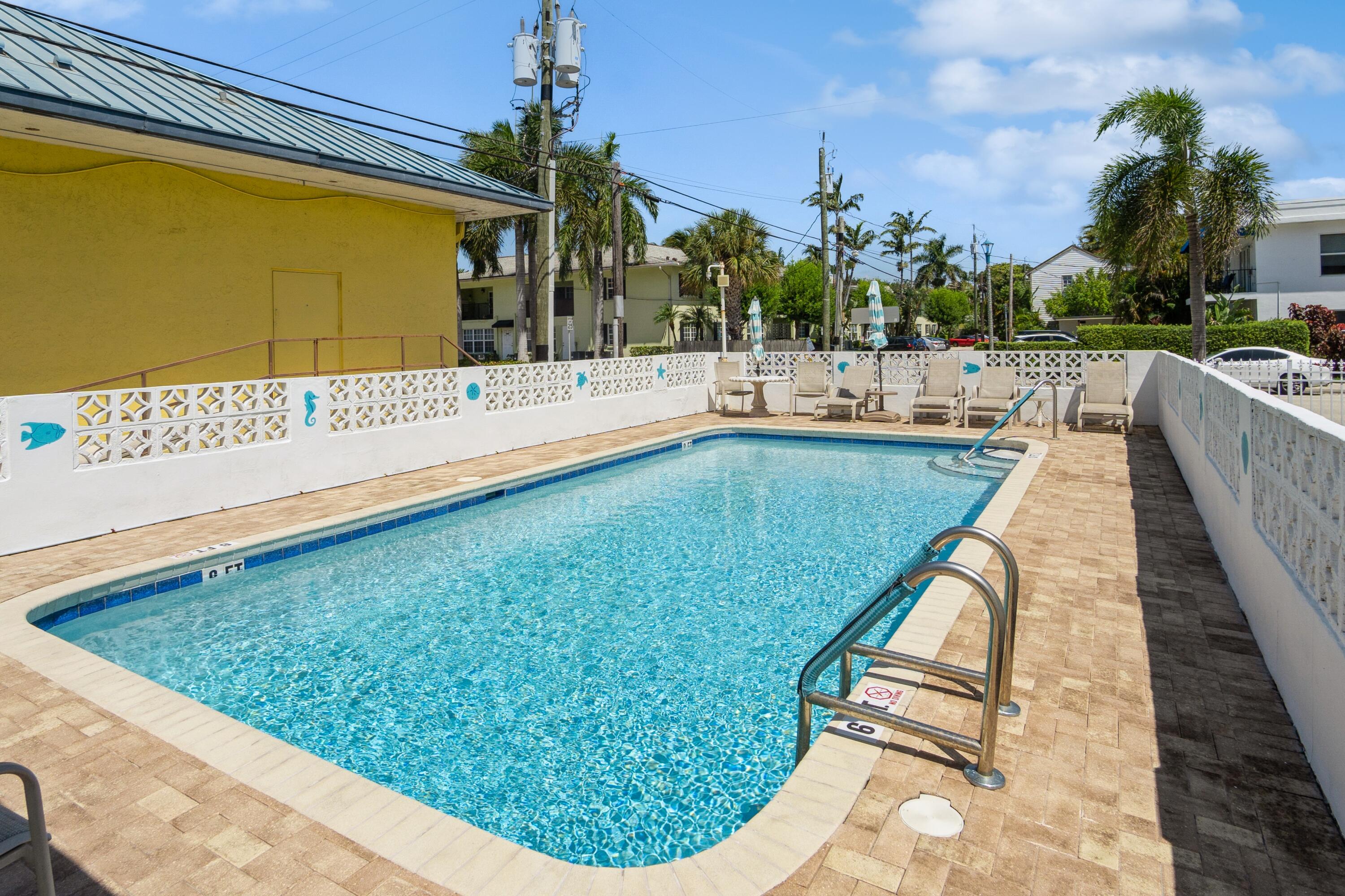1 North Golfview Road, Unit 702 Lake Worth Beach, FL 33460 - Photo 13 of 13 28_1NGolfviewRd_Apt702_29_Pool_HiRes