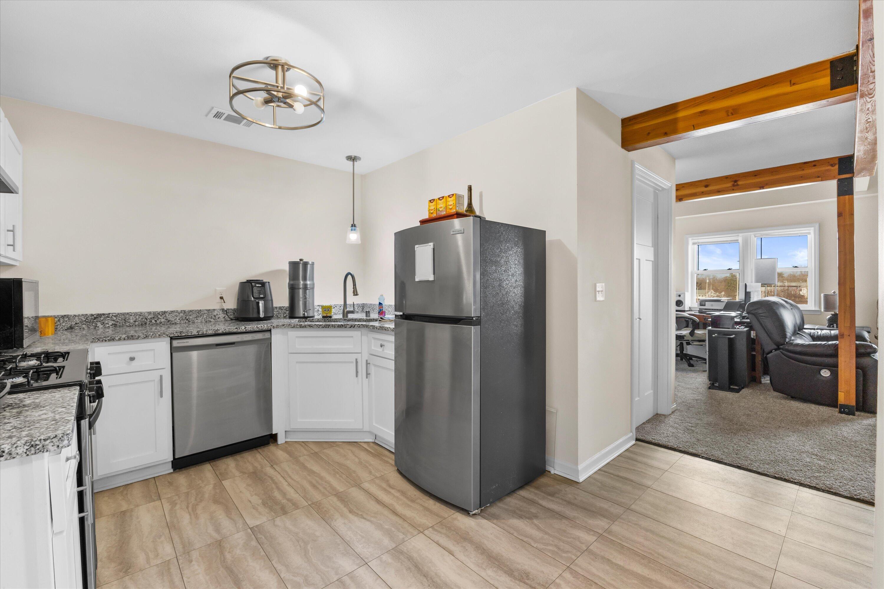 100 Main Street, Unit 204 Pewaukee, WI 53072 - Photo 12 of 29 20-IMG_4618