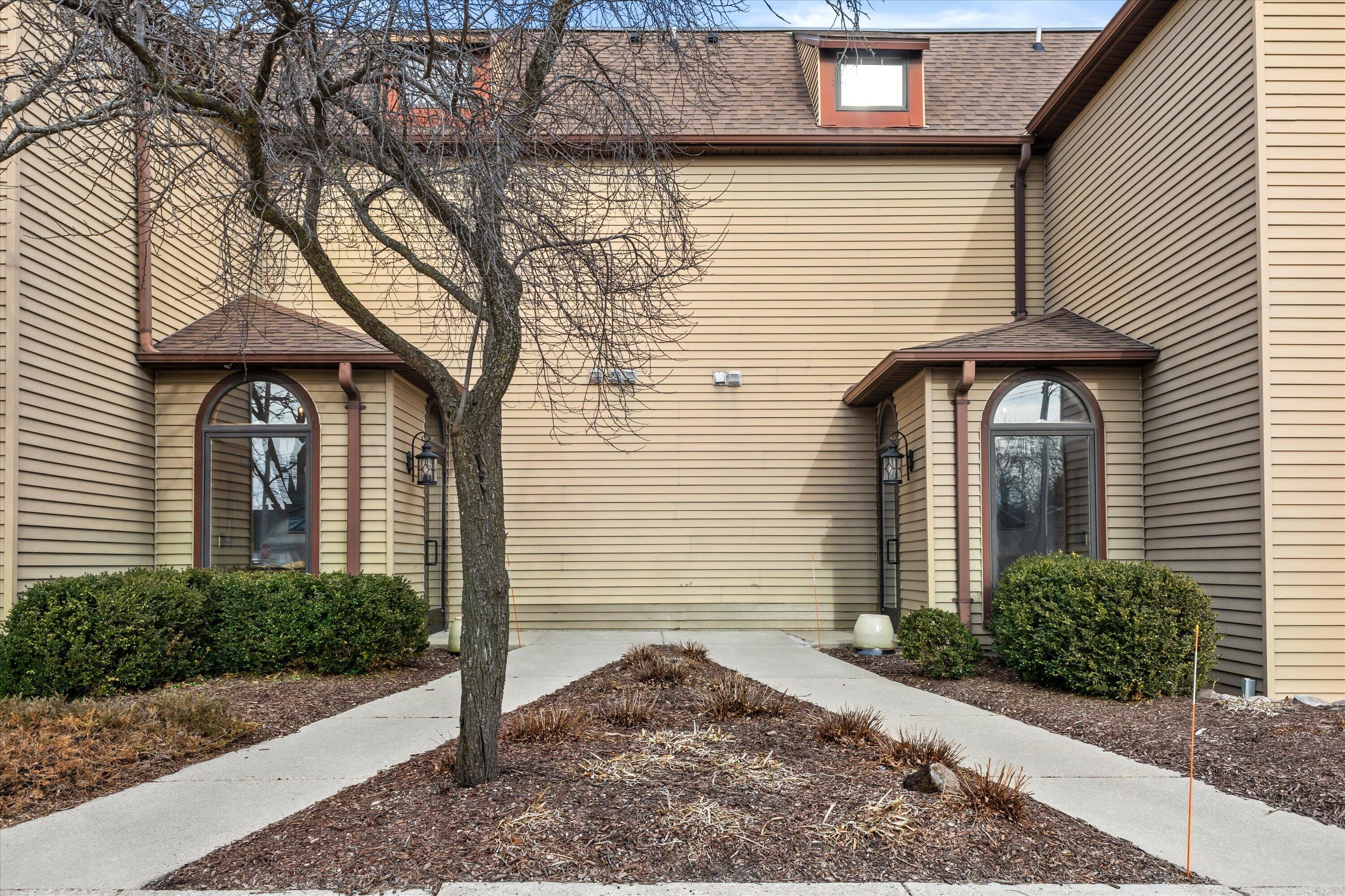 100 Main Street, Unit 204 Pewaukee, WI 53072 - Photo 2 of 29 06-IMG_4510