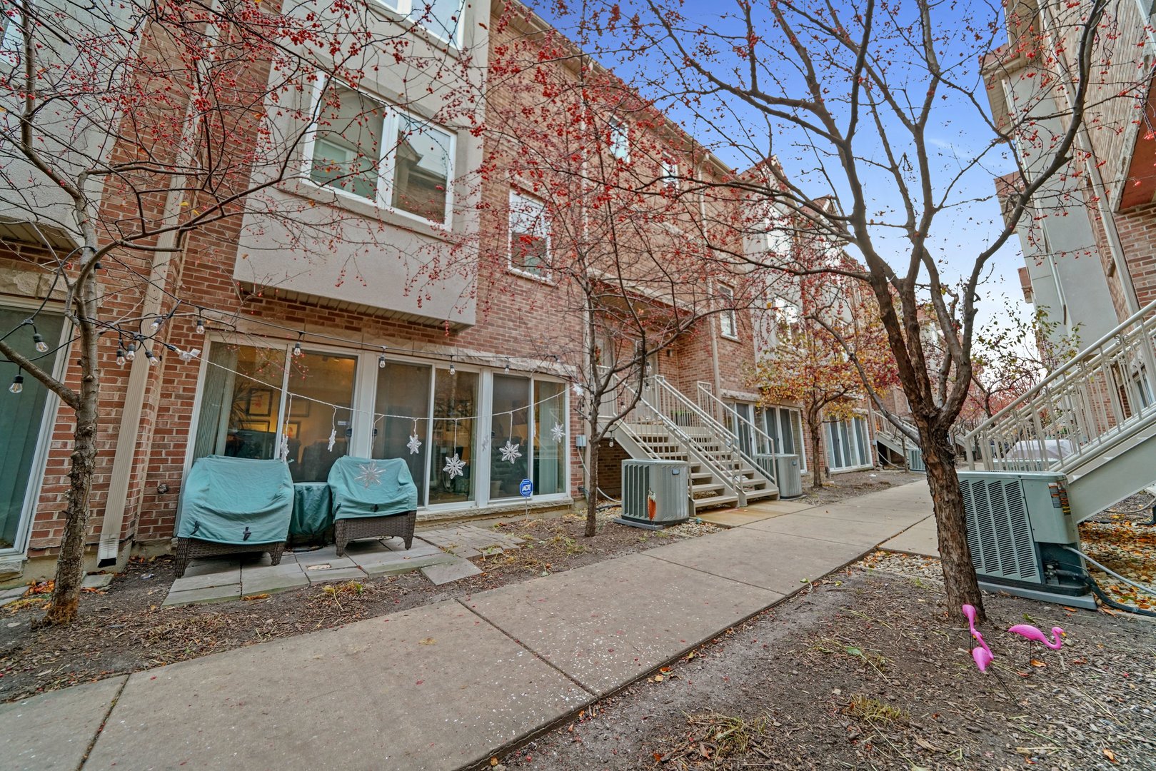 a view of a building with a yard
