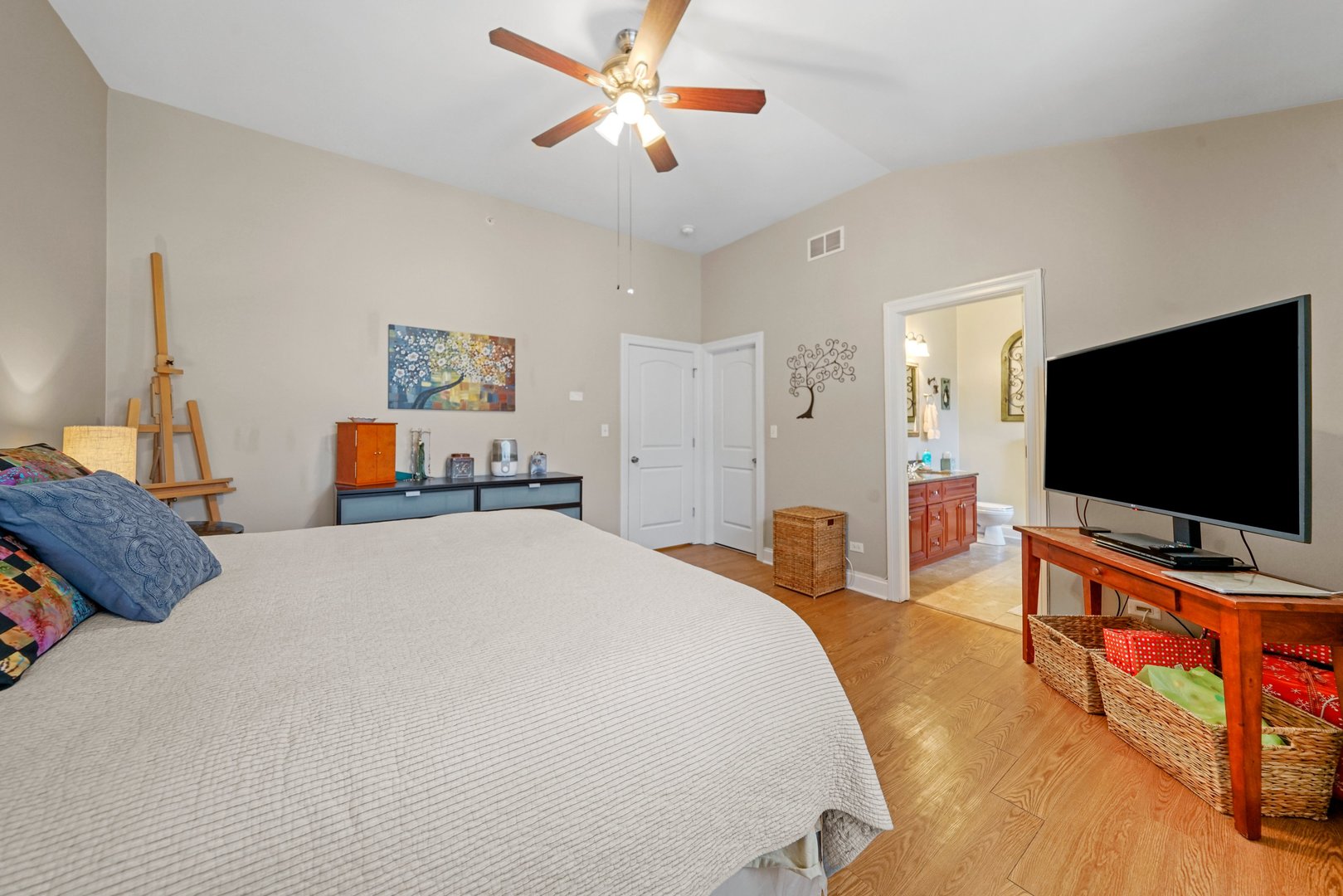 3922 Wehrman Avenue, Unit 3922 Schiller Park, IL 60176 - Photo 14 of 28 a bedroom with a bed and a flat screen tv