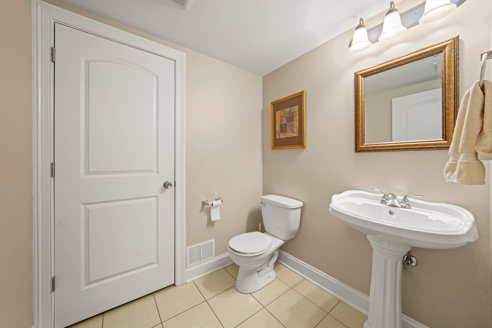 3922 Wehrman Avenue, Unit 3922 Schiller Park, IL 60176 - Photo 15 of 28 a bathroom with a toilet sink and mirror