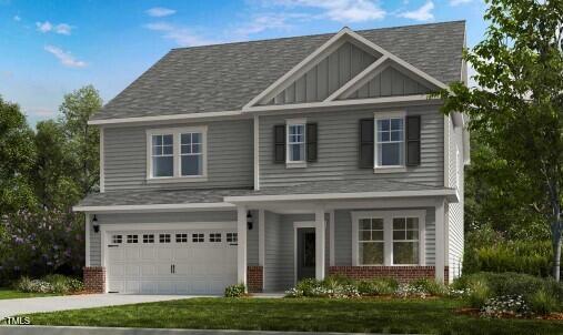 250 Tidal Pool Way Cary, NC 27519 - Photo 1 of 9 a front view of a house with a yard and garage