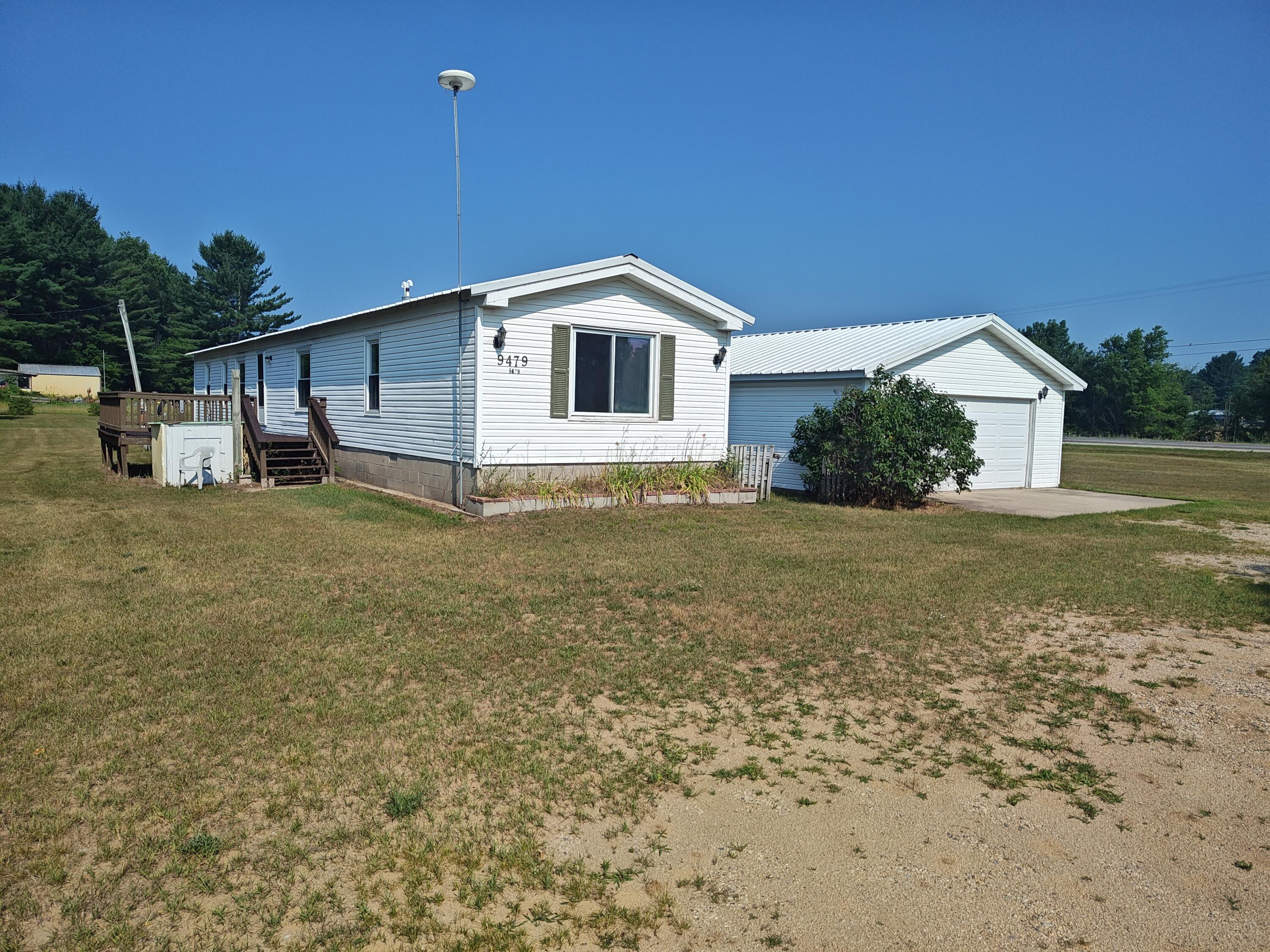 9479 Bailey Road Howard City, MI 49329 - Photo 1 of 13 b12