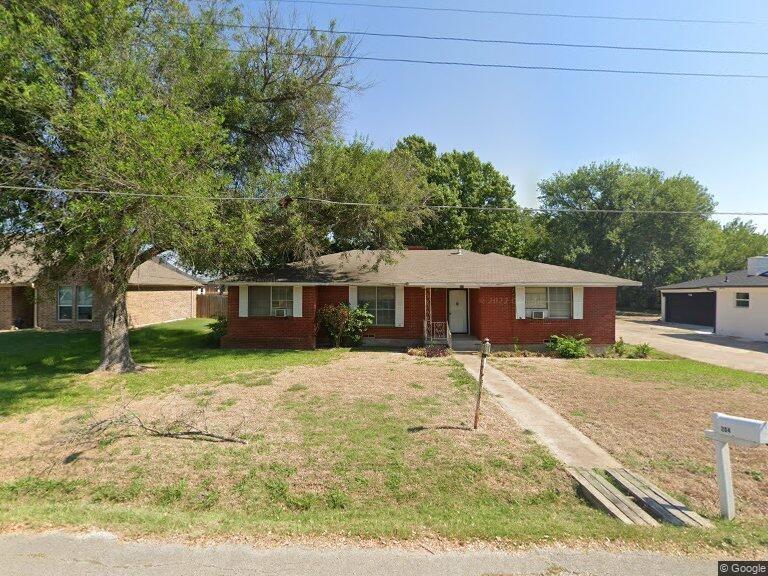 204 Boles Street Forney, TX 75126 - Photo 1 of 1 a front view of a house with garden