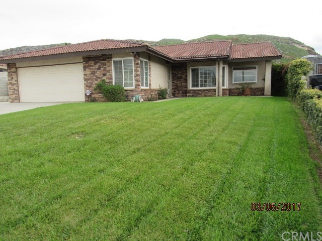 2984 Donner Way Riverside, CA 92509 - Photo 1 of 1 a front view of a house with garden