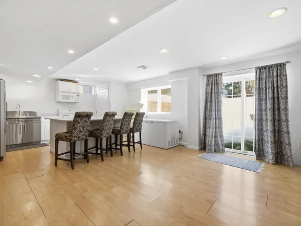 a view of a dining area with furniture and window