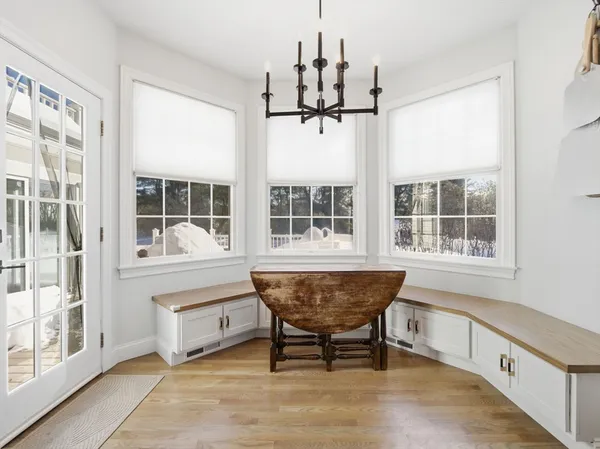 a view of a room that has a couch and a table in it