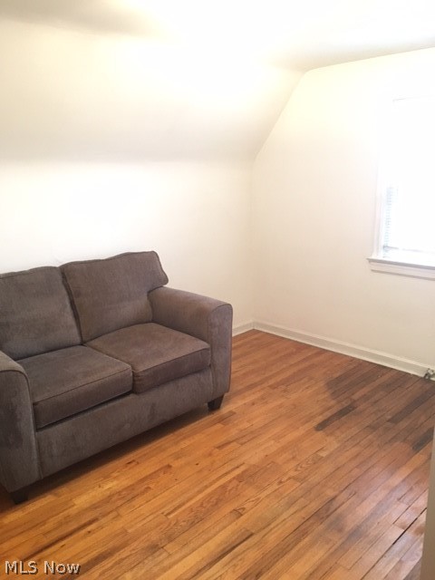 3645 Winchell Road Shaker Heights, OH 44122 - Photo 36 of 37 Living room with wood-type flooring and vaulted ceiling