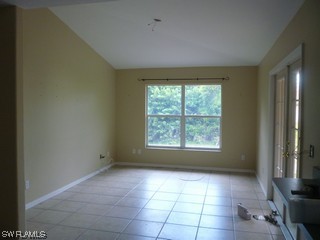 18554 Olive Road Fort Myers, FL 33967 - Photo 2 of 5 a view of an empty room with a window
