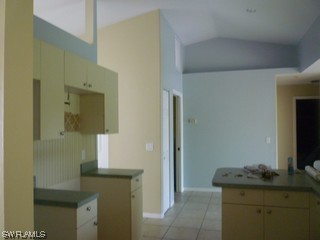 18554 Olive Road Fort Myers, FL 33967 - Photo 4 of 5 a bathroom with a granite countertop sink and a mirror