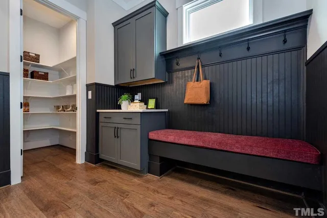 a bed room with a bed and cabinets