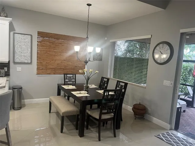 a view of living room with furniture and a couch