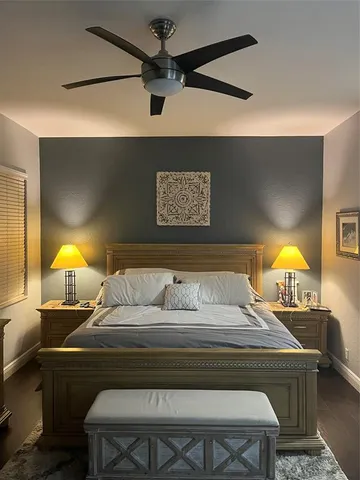 a bathroom with a sink mirror and shower