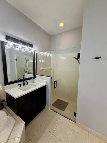 a kitchen with a stove and cabinets