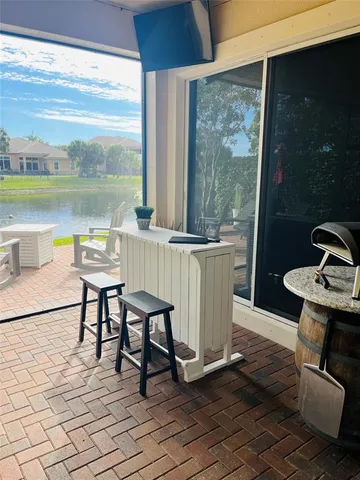 a view of a lake from a balcony with a lake view