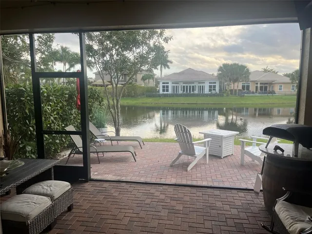 a view of a small yard with a fountain