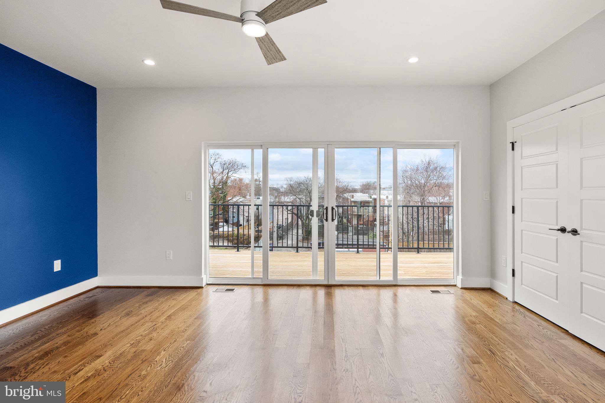 117 17th Street Southeast, Unit 2 Washington, DC 20003 - Photo 20 of 31 a view of empty room with wooden floor and fan