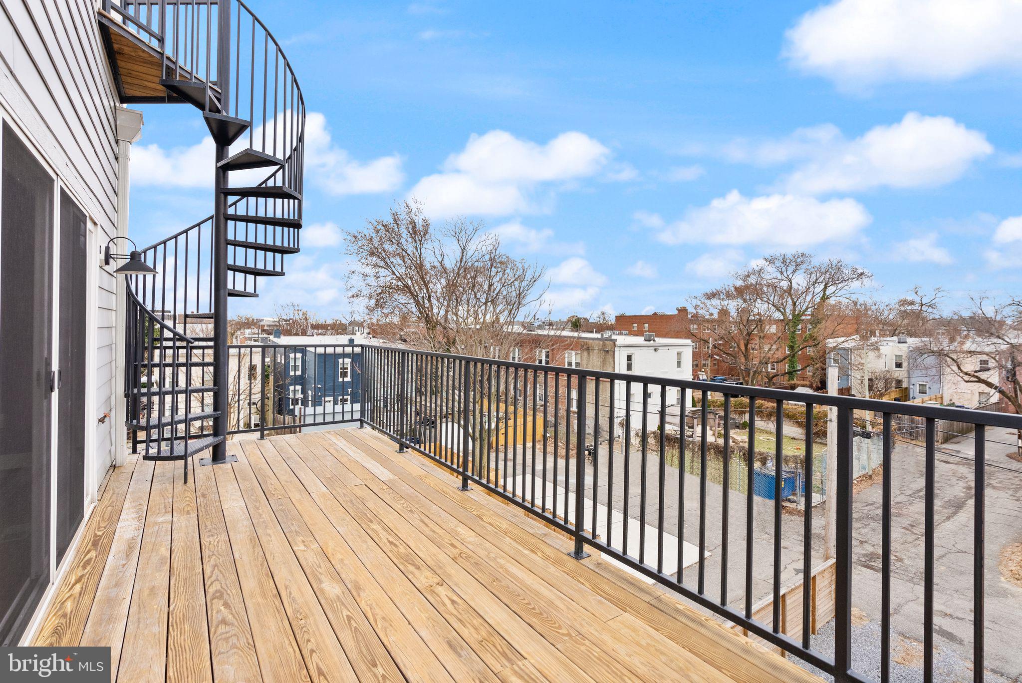 117 17th Street Southeast, Unit 2 Washington, DC 20003 - Photo 24 of 31 a view of balcony with wooden floor