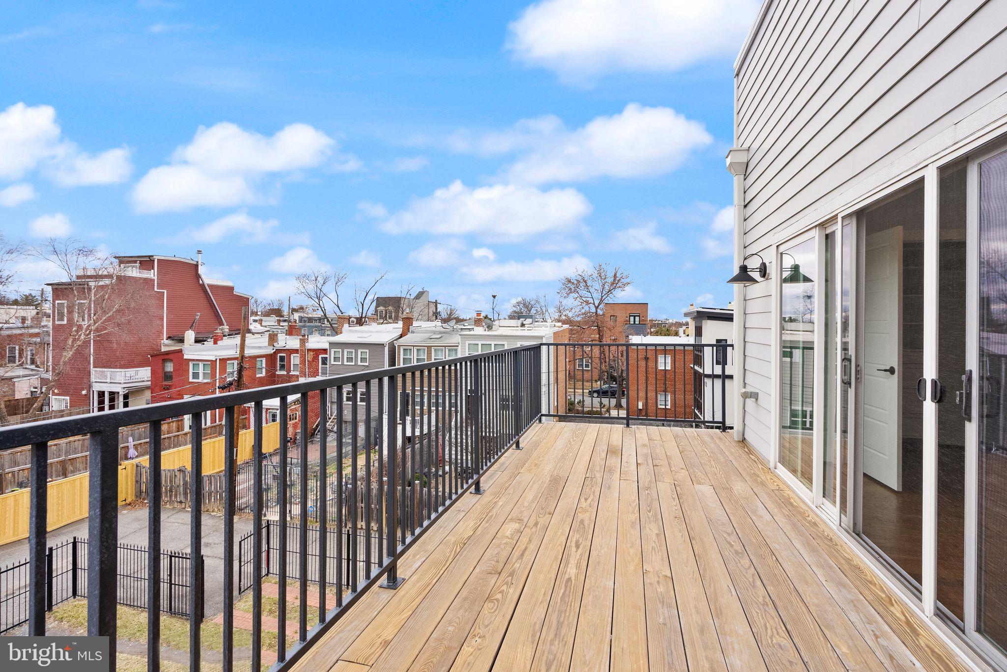 117 17th Street Southeast, Unit 2 Washington, DC 20003 - Photo 29 of 31 a view of balcony with wooden floor