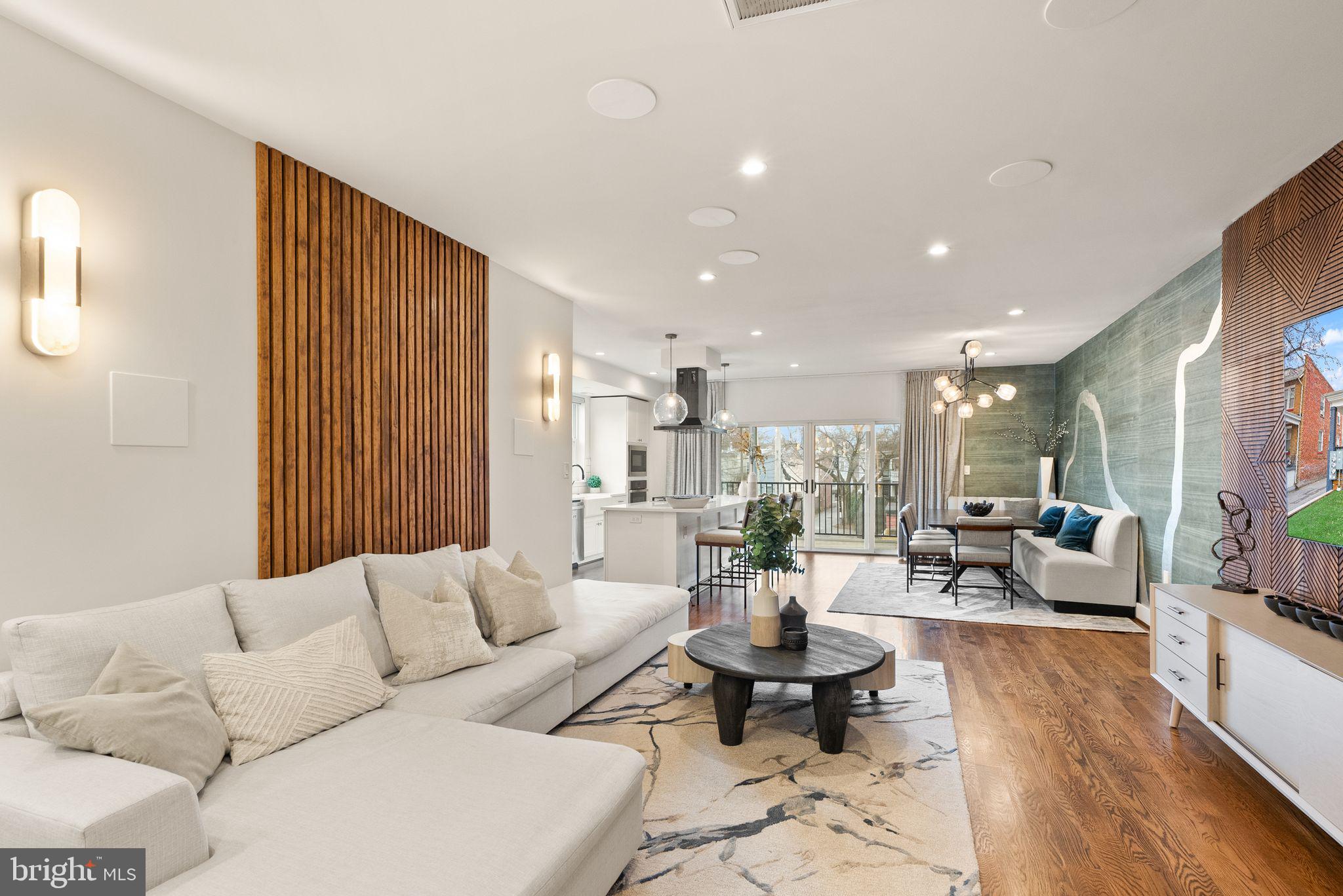 117 17th Street Southeast, Unit 2 Washington, DC 20003 - Photo 5 of 31 a living room with furniture and wooden floor