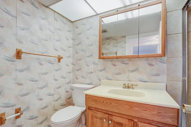 a bathroom with a sink and shower