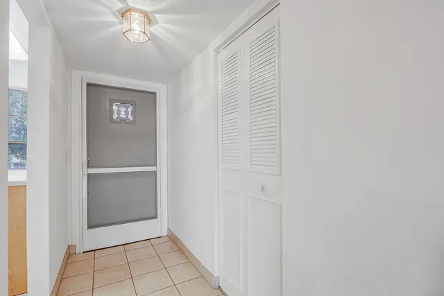 a view of a backyard with a garden