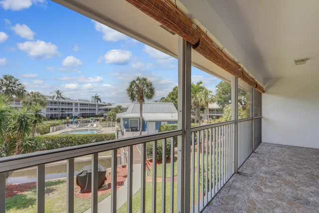 a view of a street from a balcony