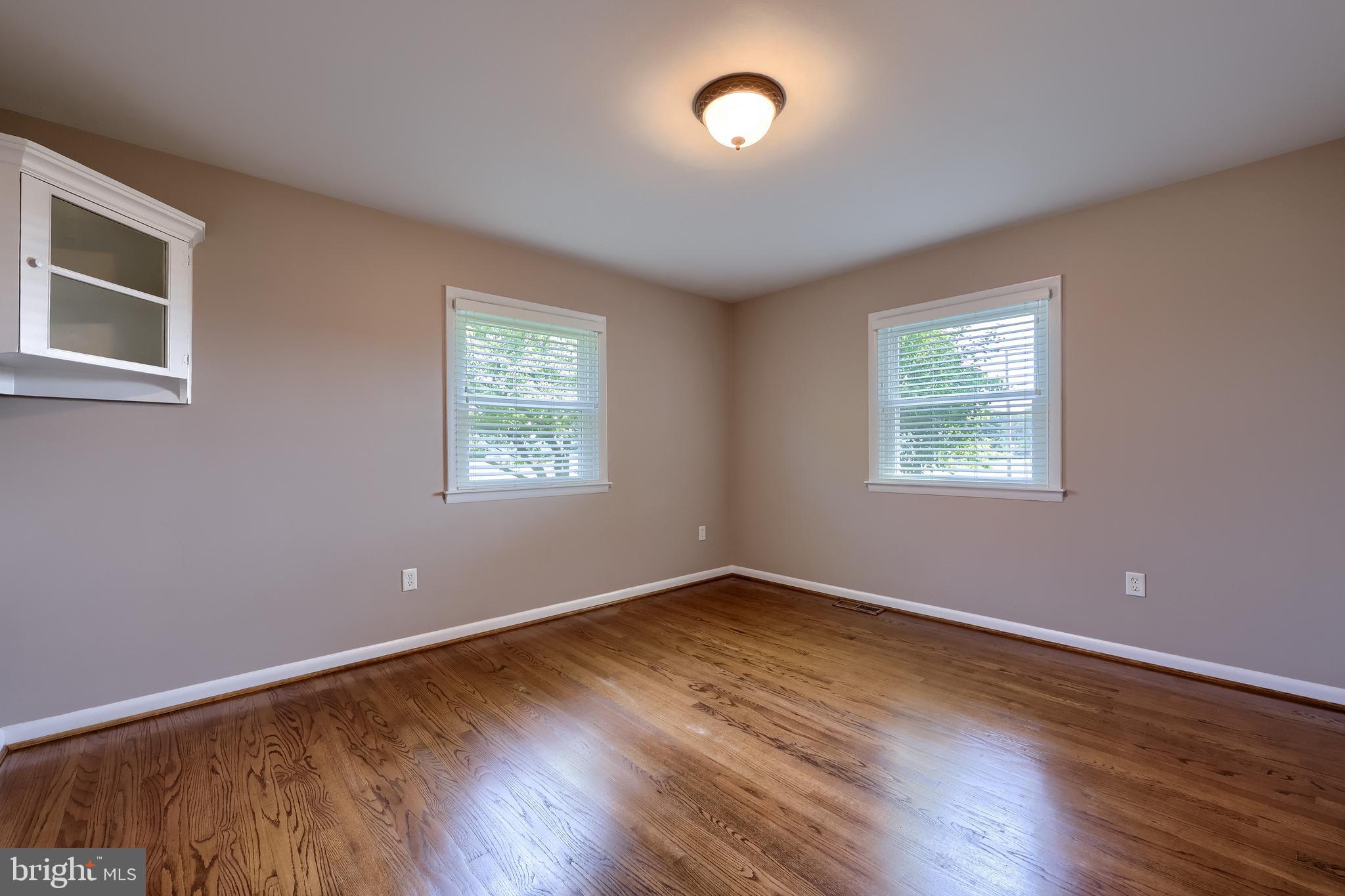 502 West Newport Road Lititz, PA 17543 - Photo 45 of 61 a view of an empty room with wooden floor and a window